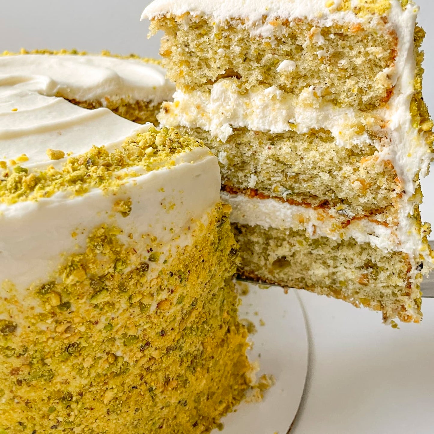 Pistachio Cake W/ Swiss Meringue Buttercream Frosting (2 Layer)